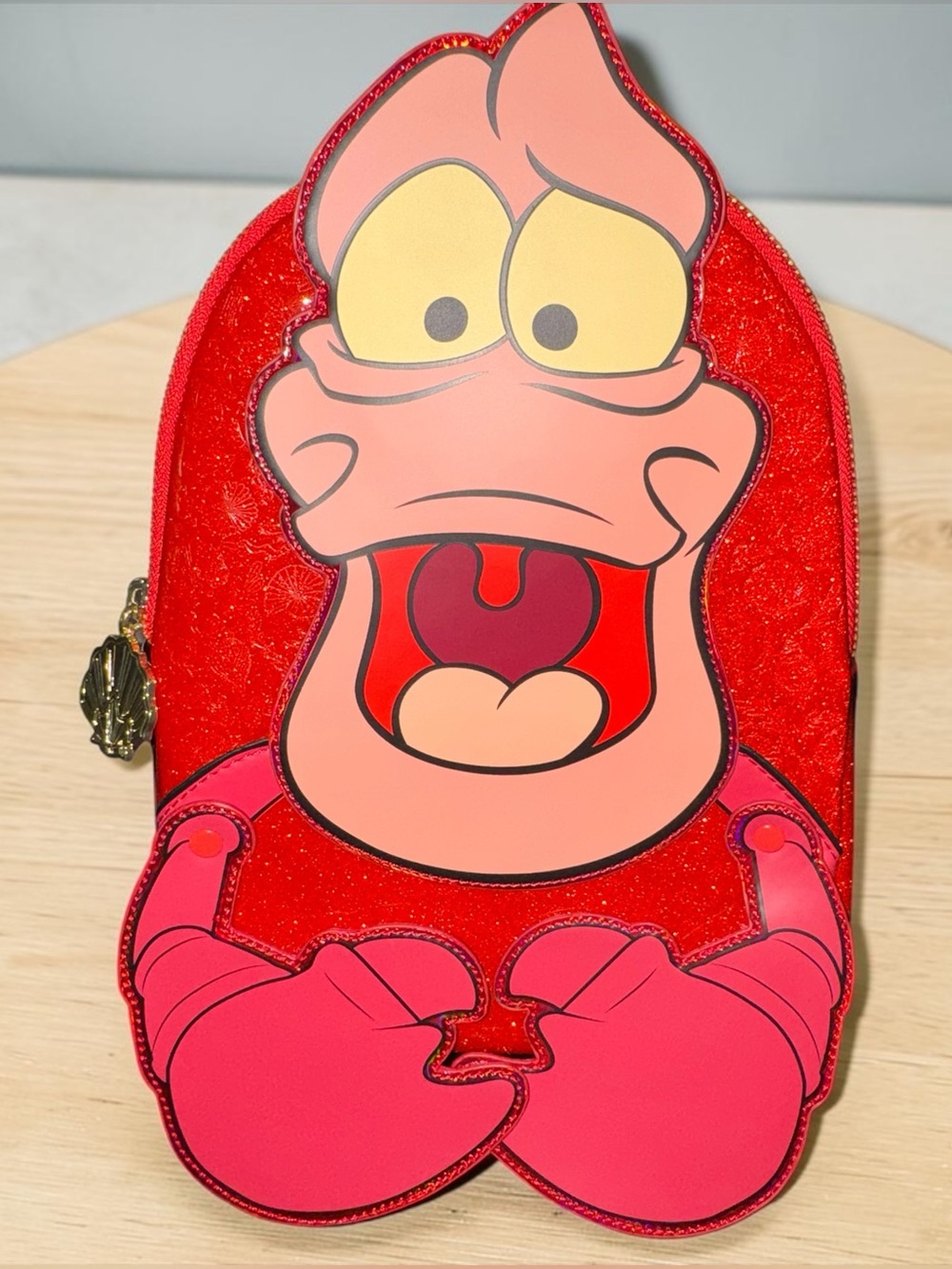 Loungefly Little Mermaid Sebastian Glow in the Dark Mini Backpack